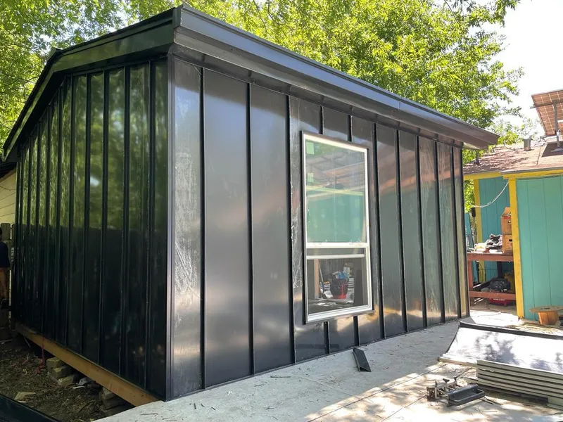 Black standing seam metal wall panels for Metal Roof Installation in Fort Edward